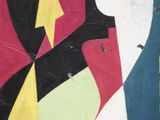 a painting on the wall of a building that has a colorful design on it