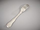 a fork that is sitting on a table