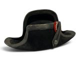 a black hat that has a red tag on it