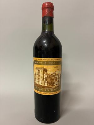 a bottle of wine that is sitting on a table