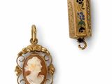 an image of a gold locke with a picture of a woman on it