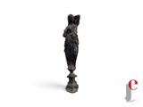 an image of a statue of a woman standing on a white surface