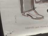 a drawing of a pair of shoes on a piece of paper