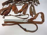 a lot of leather items that are on the table