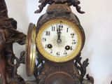 a clock that is sitting on top of a table