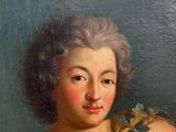 portrait of a young woman with a flower in her hair
