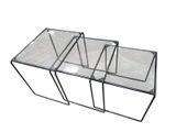 three glass nesting tables on a white background with a white background