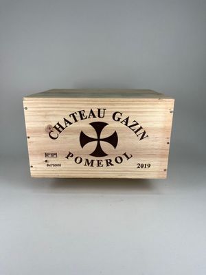 a close up of a wooden box with a cross on it