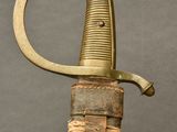 a close up of a knife with a rope on it