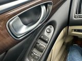 a close up of a person ' s foot in a car