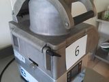 a pizza oven sitting on top of a table