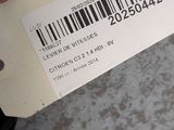 a person that is holding a barcode in their hand