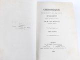 a book opened to show the title of a novel