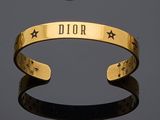 Bracelet manchette Christian Dior plaqué or orné d'étoiles