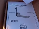 a box with a manual and a forklift inside of it