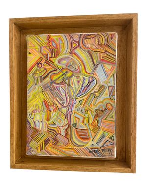 un tableau dans un cadre en bois sur fond blanc