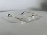 a close up of a pair of glasses on a table