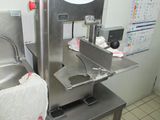 a machine that is sitting on a table in a kitchen