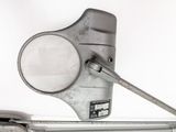 a close up of a metal object with a magnifying glass on it