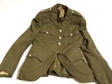 an image of a green military jacket with buttons on the front