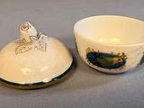 a small bowl and a small bowl sitting on a table