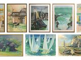 many paintings on the wall of this room