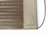an image of a wallet with a chain on the front