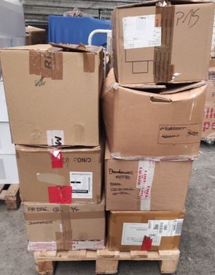 many boxes stacked on top of each other on a pallet