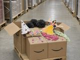 a cardboard box with decorations on top of it in a warehouse