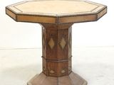 a wooden table with a wooden top and a wooden base