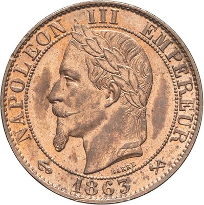 Gros plan sur une pièce de monnaie portant le visage d'un homme