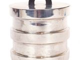 a silver container with a black handle on a white background