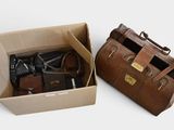 a brown bag and a brown bag in a box