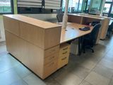 an image of an office with a desk and two chairs