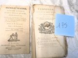 deux vieux livres posés sur une table, avec une étiquette de prix