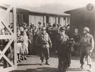 a group of people standing in front of a building