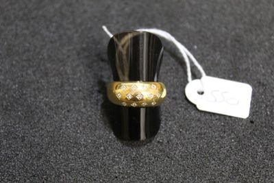 a ring that is on top of a black table