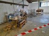 a room that has a lot of work in it