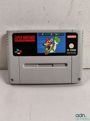 an old nintendo super mario game is shown on a white surface