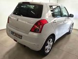 a white car that is parked in a garage