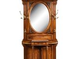 a wooden cabinet with a mirror on top of it