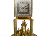 a clock that is sitting on top of a table