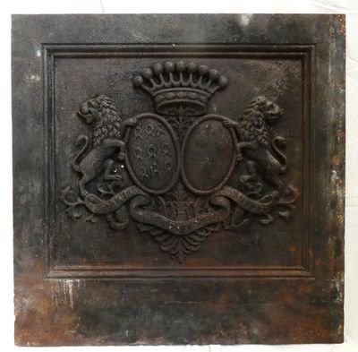 an old metal plaque with a coat of arms and two lions on it