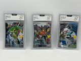 three different pokemon trading cards in plastic cases on a white surface