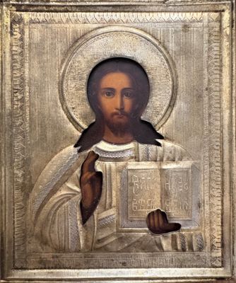 une image représentant un tableau où l'on voit Jésus tenant un livre entre ses mains