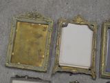 four different frames that have been placed on the floor