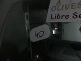a sign that says olives libre ses on the side of a car
