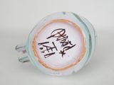 a cup that has been decorated with a name on it