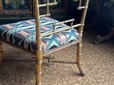 an image of a chair with a colorful upholstered seat