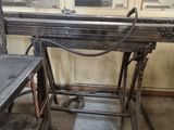 an image of a workbench in a workshop with a window